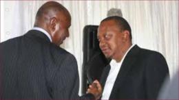 Former Auditor General Edward Ouko shares a moment with former president Uhuru Kenyatta.